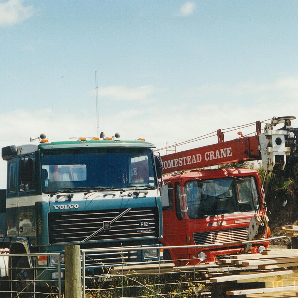 homestead construction old truck and crane